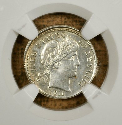 1911 Barber Dime off-center strike error showing blank planchet area and shifted design